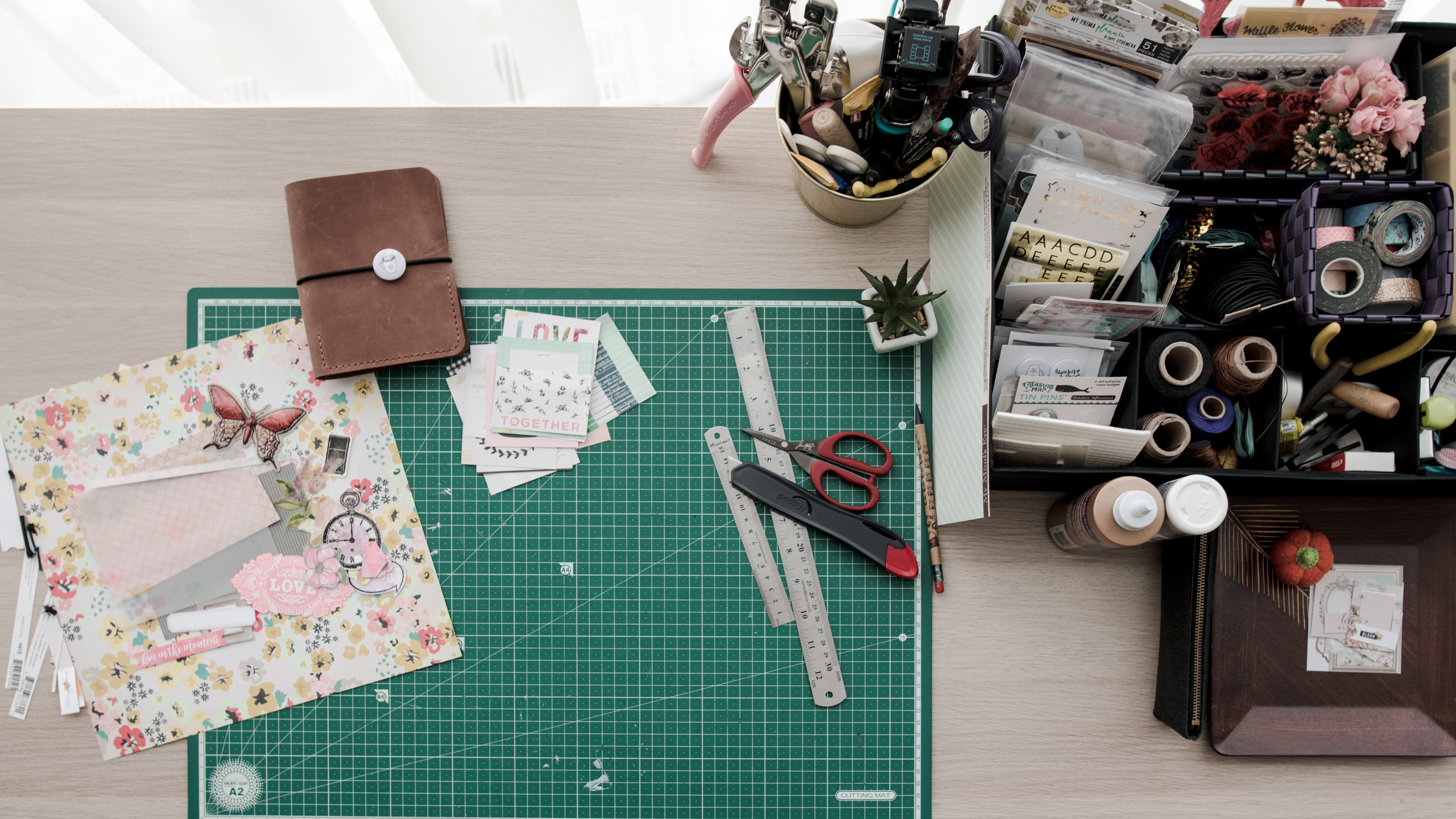 Desk with crafting supplies on it