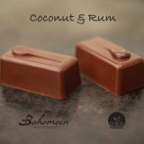 Dark chocolate and coconut cream blended with rum and folded thought with coconut in a dark chocolate shell.