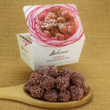 Bohemein Raspberry Mini Chocolate Truffle is raspberry puree and white chocolate ganache. Coated in 53% dark chocolate and rolled in RUBY sprinkles