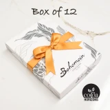 Bohemein 12 Dark  Chocolates Gift Box includes: Passion Fruit Martini, Bosenberry Caramel, Raspberry Ganache, Apricot and Rosemary  Ganache, Crunchy Hazelnut, Mint Caramel, Ginger Caramel, Chilli Ganache, Vanilla Cream - Dark, Pistachio Marzipan, J.Becher , Black Devil Caramel