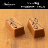 Bohemein Crunchy Hazelnut Milk - Crunchy Hazelnut Milk - A twist on the traditional Gianduja filling of hazelnut praline and chocolate with a hint of salt. The rich hazelnut flavour is balanced with the sweet milk Chocolate Shell.
Contains- Milk, Soy,Hazelnuts