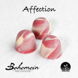 Affection - Description - Soft, Sweet Ganache with real Strawberry and Raspberry with a hint of Rosewater in a Sweet Ruby and White Chocolate Shell
Filling - White Chocolate(46.5% sugar, cocoa butter, full cream milk powder 23.5%, soy lecithin, vanillin) Raspberry Pulp, Strawberry Puree, Dextrose, dried Strawberry, Vanilla, Rose Water, Salt, Arrowroot
Shell -  Ruby Chocolate(sugar, cocoa butter, skimmed milk powder, whole milk powder, cocoa mass; soy lecithin; citric acid, natural vanilla flavouring) White Chocolate(46.5% sugar, cocoa butter, full cream milk powder 23.5%, soy lecithin, vanillin)
Contains -  Milk, Soy, Sulphites