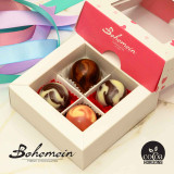 Mothers Day box of 4 dome Chocolates included: 
Orange Mimosa - Orange Caramel +  Blanc de Blancin 54.5% DARK chocolate shell with WHITE Chocolate marble finish  contains Soy, Milk, Alcohol
French Toast - Cinnamon Caramel + Maple Cream in MILK chocolate shell with DARK chocolate marble finish Contains Soy, Milk
Raspberry Friand - Raspberry Marmelade + Amaretto Marzipan in WHITE chocolate shell with RUBY marble finish Contains Soy, Milk, Almonds, Alcohol