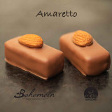 Bohemein Amaretto. A heady blend of ever-so-slightly bitter amaretto liqueur, and milk chocolate in soft butter ganache. Contains Milk (Dairy), Almonds, Alcohol
