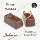 Bohemein Pinacolada - Pineapple and coconut cream combine with a hint of alcohol to create a surprisingly creamy, vegan friendly, tropical treat, the 53%  dark chocolate shells elegantly balances the sweet and fruity filling, Vegan Friendly
contains - Alcohol, pineapple, coconut