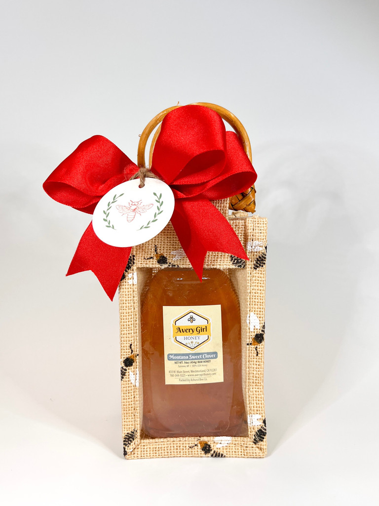 The Single Burlap Bag Honey Gift comes with your choice of a 16 ounce honey variety topped with a seasonal bow ready for you to give to the sweet people in your life. 
