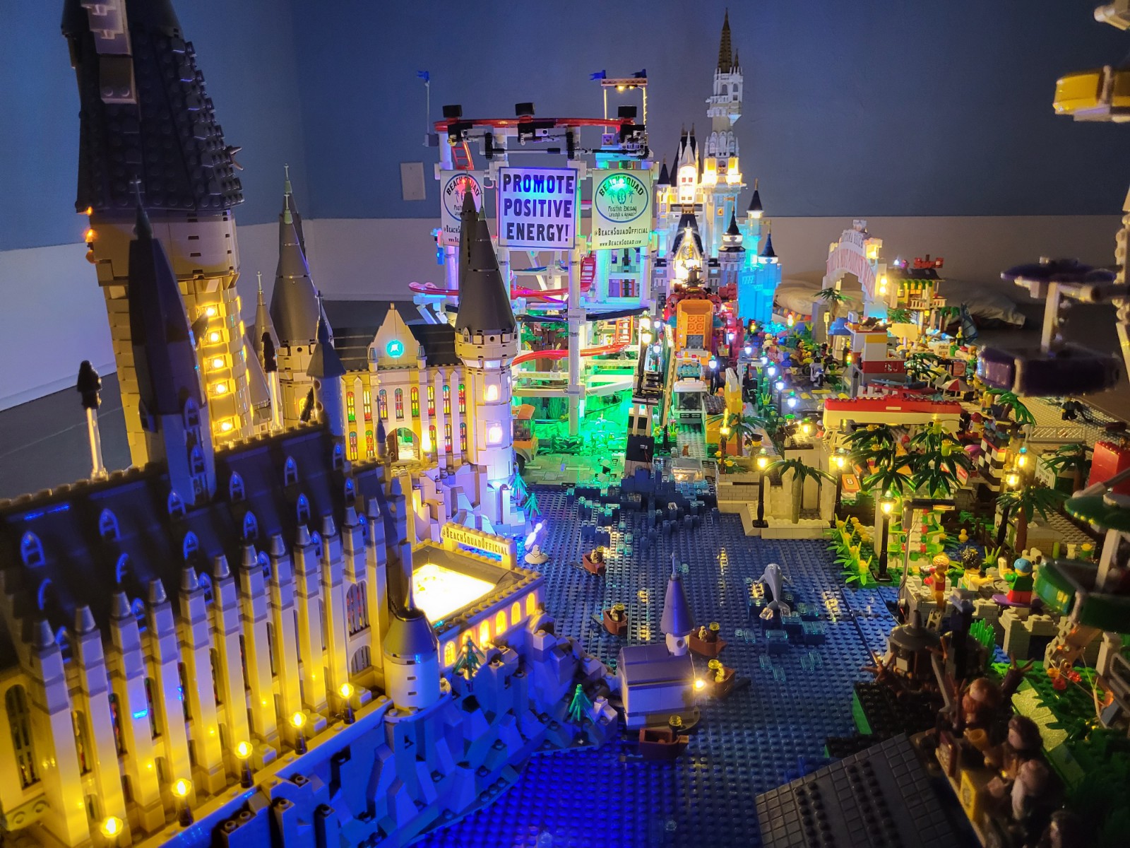 Beach Squad Lego Window Display Hogwarts castle and roller coaster lit up