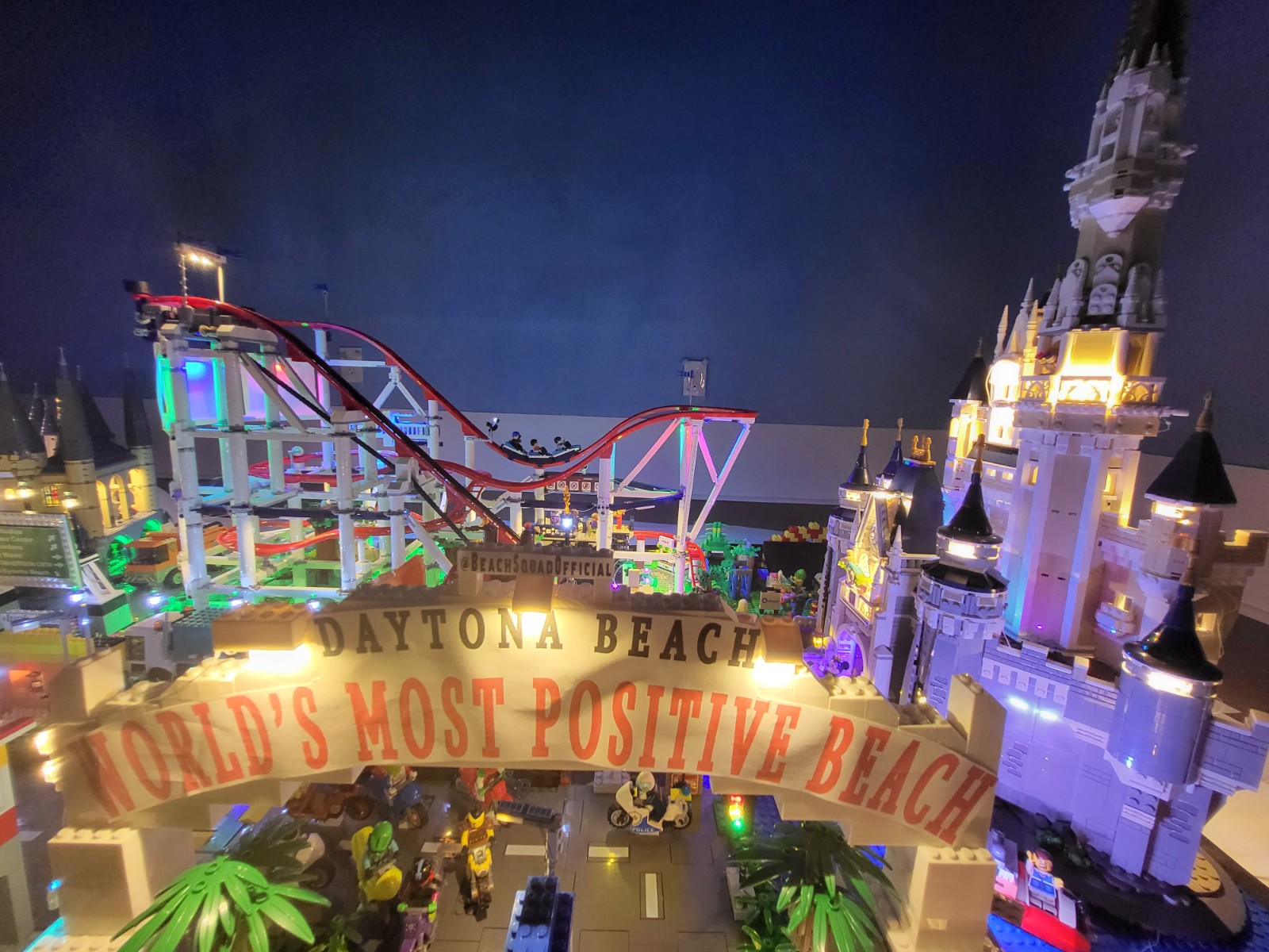 Beach Squad Lego Window Display Daytona BEach Worlds Most Famous BEach Sign and Disney Castle