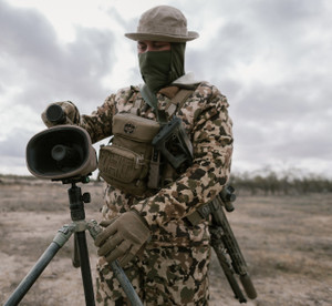 Wade Chandler wearing the Alaska Guide Creations Ravus Bino Harness in Tan – field-tested chest rig with Gen L Harness and Ravus Pocket, optimized for predator hunting, Ally Munitions approved, made in USA Wade Chandler wearing the Alaska Guide Creations Ravus Bino Harness in Tan – field-tested chest rig with Gen L Harness and Ravus Pocket, optimized for predator hunting, Ally Munitions approved, made in USA