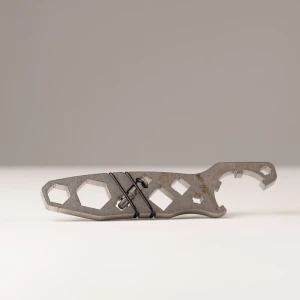 Q Fix Multi-Tool designed for field adjustments and maintenance of Q Fix rifles, providing a compact solution for Fix-specific hardware and common rifle adjustments.