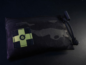 Flatline Ops OH-SH*T-KIT Ultralight Waterproof Micro Abrasion Kit featuring XPAC waterproof construction with blister care, friction prevention, and first-aid essentials for hunting, hiking, and range use.