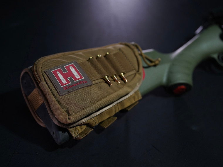Hornady cheek pad tan on bolt-action rifle with scope – side view
