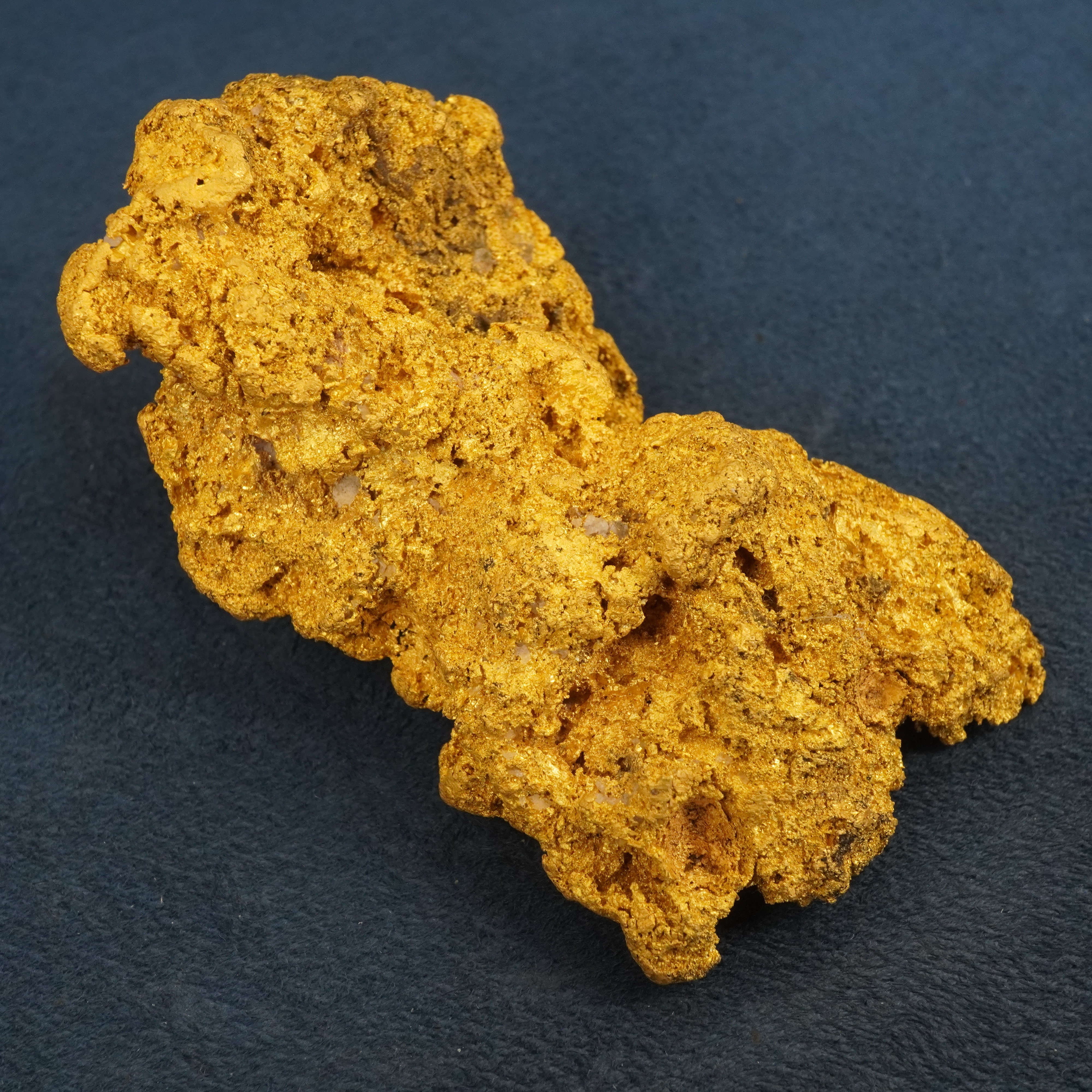 243 gram 23 karat Australian gold nugget shown length-wise