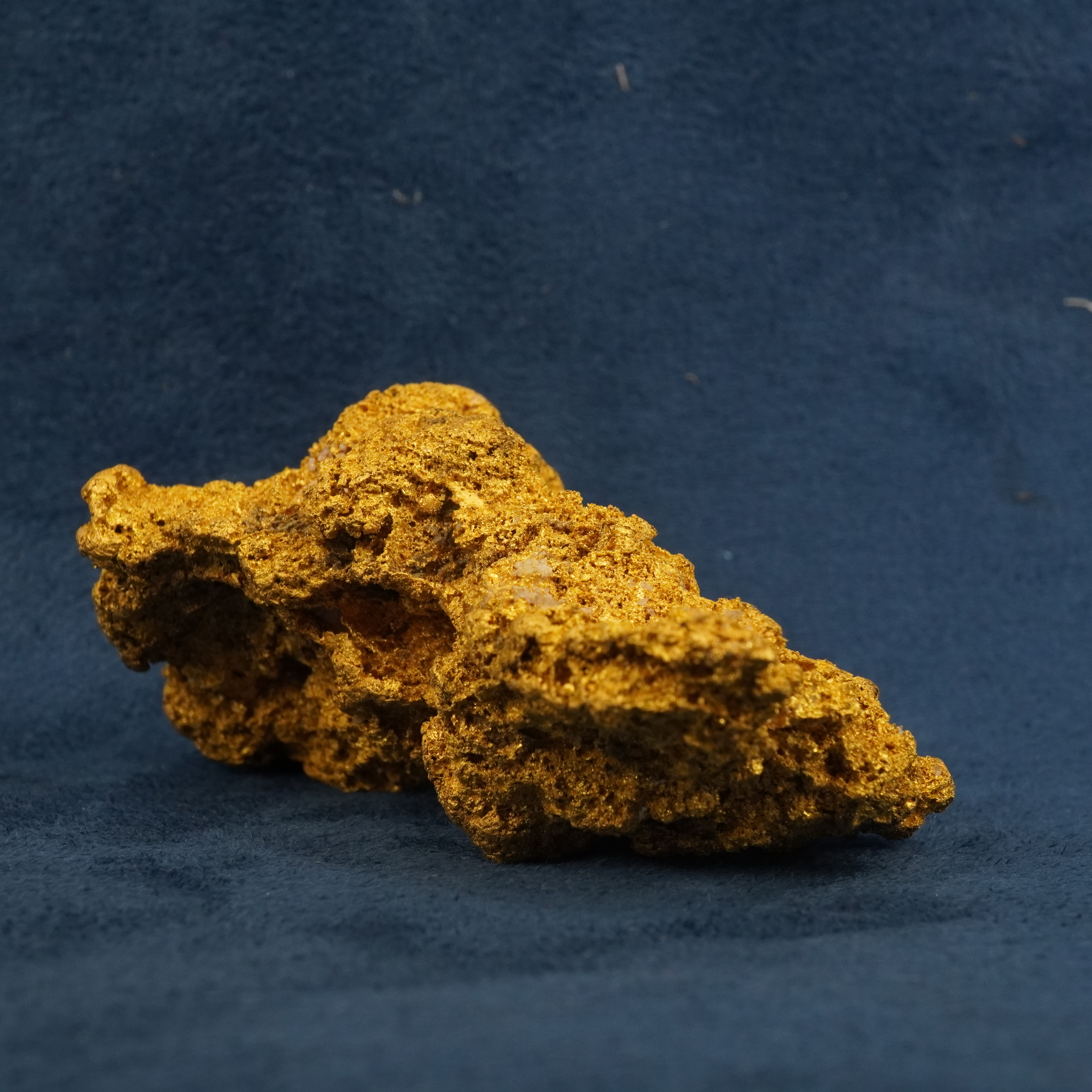 243 gram 23 karat Australian gold nugget shown from its shadow angle
