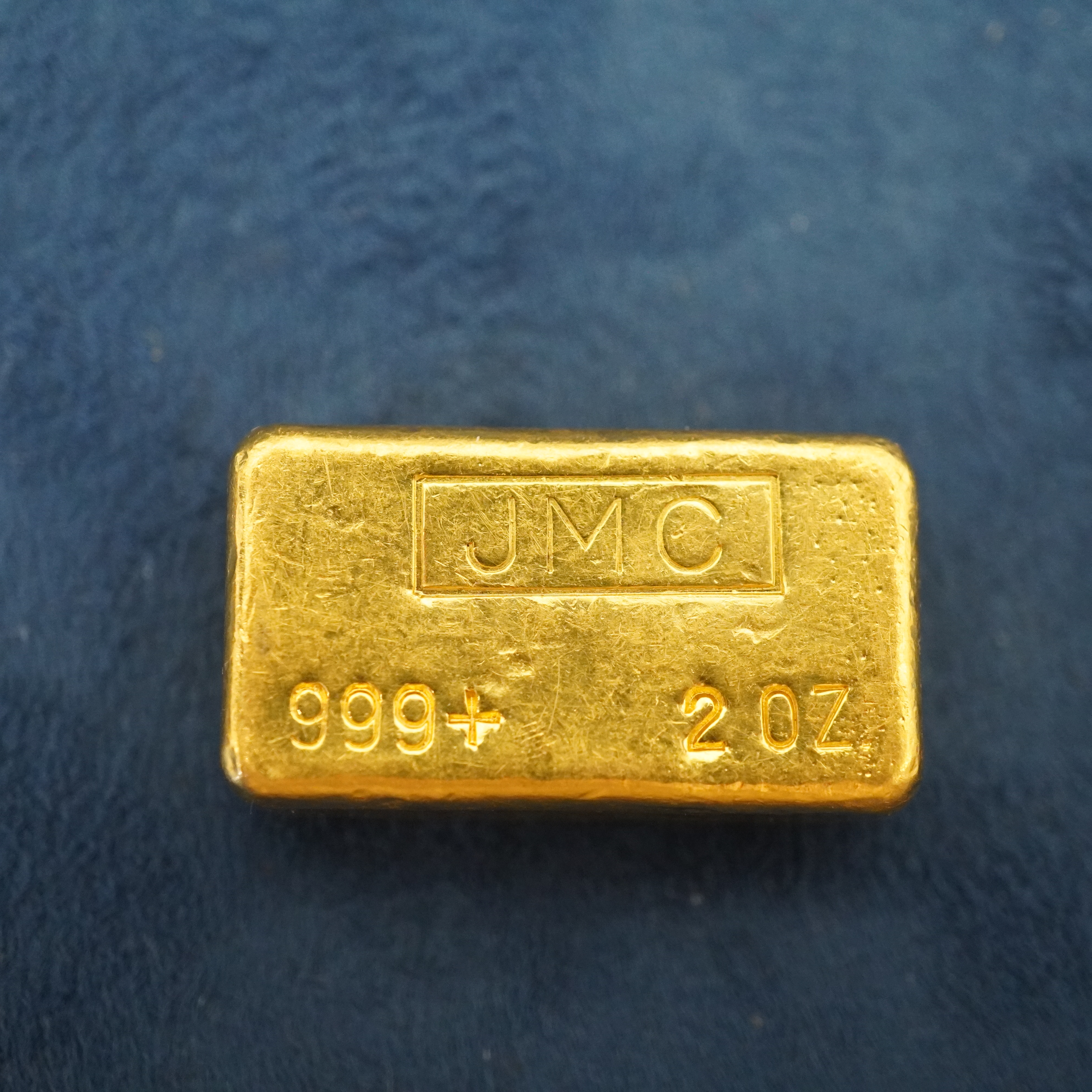 2 troy ounce bar of pure gold.