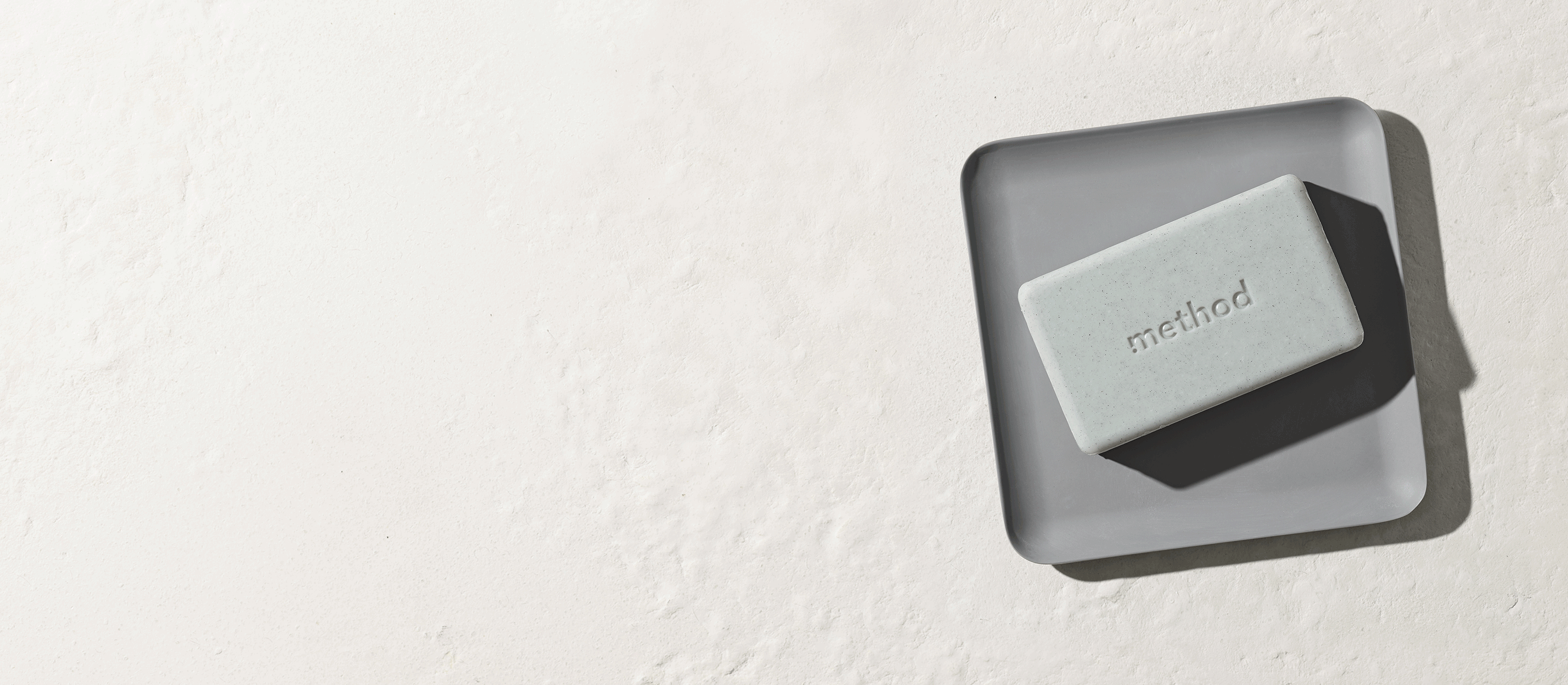 Method bar soap on gray dish lathering gif