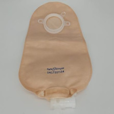 Beige 2-Piece 9-inch Urostomy Pouch with drain at the bottom and flange at the top