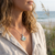 Tide Jewellery inlaid Paua shell scallop shell pendant on 18" trace chain