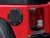 2007-2018 Jeep Wrangler JK fuel filler door - installed close-up on red Jeep
