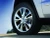 2011-2022 Jeep Grand Cherokee WK2 production bright chrome wheel - mounted on vehicle close-up