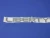 2002-2004 Jeep Liberty KJ Chrome "Liberty" badge - angled front view
