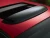 2007-2016 Jeep Patriot MK sunroof air deflector - installed on blue vehicle roof