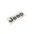 2020-2025 Jeep Gladiator JT tailgate badge - angled close-up of Jeep badge