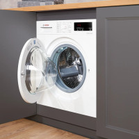 Bosch Series 6 WIW28302GB Integrated 8kg Washing Machine with 1400 rpm - White - Washing machine with door open in modern kitchen