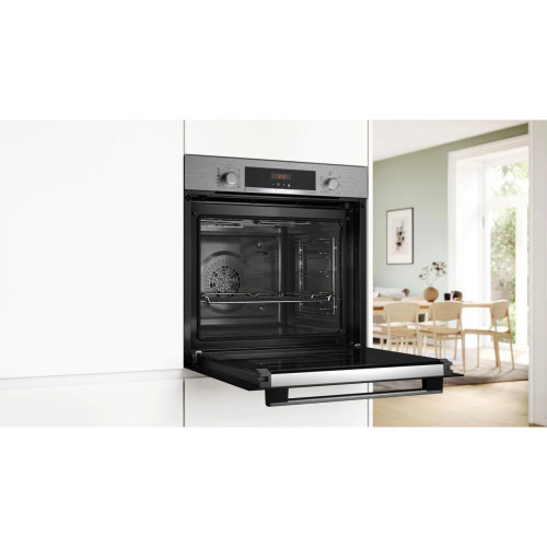 Bosch Series 4 Built In Electric Single Oven - Stainless Steel - Oven in kitchen with door open shot