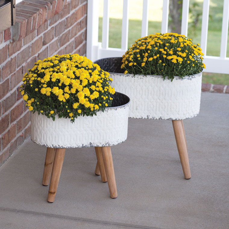 CTW Home Set Of Two Embossed Metal Planters With Wood Legs 530544