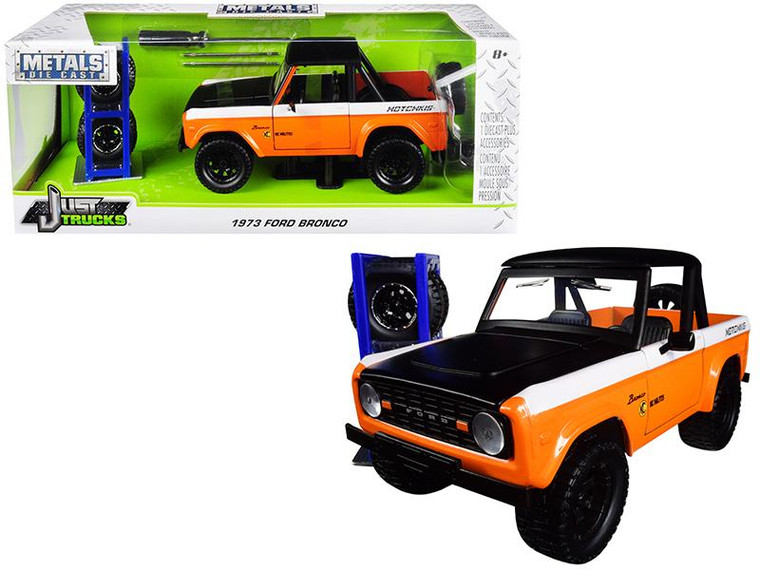 1973 Ford Bronco Metallic Orange And Matt Black "Kc Hilites" With Extra Wheels " Just Trucks" Series 1/24 Diecast Model Car By Jada" 31058