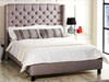 Discover the Esupasaver Alecia Upholstered Bed Frame, featuring a winged headboard adorned with diamante or matching fabric buttons. Enjoy easy assembly and solid wooden slats.  Discover the Esupasaver Alecia Upholstered Bed Frame, featuring a winged headboard adorned with diamante or matching fabric buttons. Enjoy easy assembly and solid wooden slats.