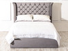 Discover the Esupasaver Sienna Gas Lift Ottoman Storage Bed, featuring elegant curved wings and deep tufted buttons for a stylish and functional bedroom solution.