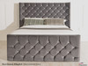 Thea gas lift ottoman bed shown in charcoal smooth velvet fabric with diamante button
