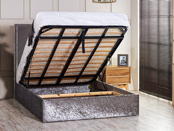 Transform your bedroom with the Esupasaver Vicenza Ottoman Storage Bed Frame, showcasing chic chrome nail accents and a low footboard for modern elegance. Transform your bedroom with the Esupasaver Vicenza Ottoman Storage Bed Frame, showcasing chic chrome nail accents and a low footboard for modern elegance.