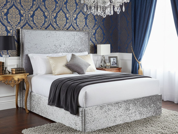 Transform your bedroom with the Esupasaver Vicenza Ottoman Storage Bed Frame, showcasing chic chrome nail accents and a low footboard for modern elegance.