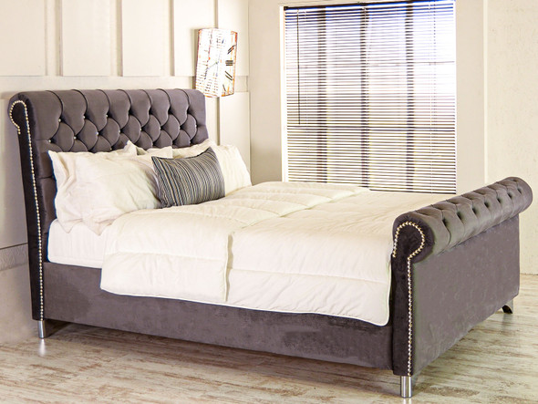 Transform your bedroom with the Esupasaver Serenity Sleigh Bed. Its high footboard and deep buttoned headboard offer both style and support for restful nights. Transform your bedroom with the Esupasaver Serenity Sleigh Bed. Its high footboard and deep buttoned headboard offer both style and support for restful nights.