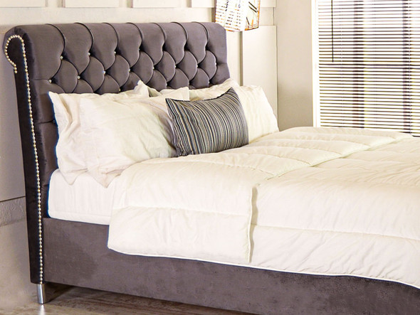 Transform your bedroom with the Esupasaver Serenity Sleigh Bed. Its high footboard and deep buttoned headboard offer both style and support for restful nights. Transform your bedroom with the Esupasaver Serenity Sleigh Bed. Its high footboard and deep buttoned headboard offer both style and support for restful nights.