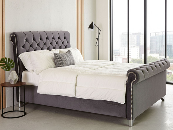 Transform your bedroom with the Esupasaver Serenity Sleigh Bed. Its high footboard and deep buttoned headboard offer both style and support for restful nights. Transform your bedroom with the Esupasaver Serenity Sleigh Bed. Its high footboard and deep buttoned headboard offer both style and support for restful nights.