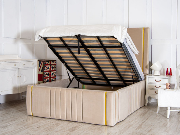  Elevate your bedroom with the Esupasaver Faith Deep Storage Ottoman Bed. Featuring chic gold accents, it combines style and functionality effortlessly.