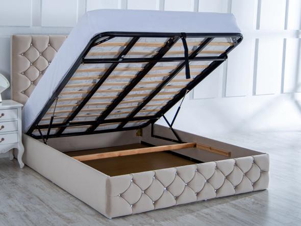 Discover the Esupasaver Isadora gas lift storage bed, featuring a deep buttoned design and ample storage space, complemented by a detailed footboard for elegance. Discover the Esupasaver Isadora gas lift storage bed, featuring a deep buttoned design and ample storage space, complemented by a detailed footboard for elegance.