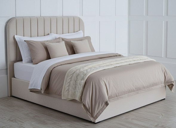 Discover the Esupasaver Brittany Ottoman Storage Bed Frame, featuring a stylish curved headboard, elegant fluted accents, and a practical low footboard for modern living.