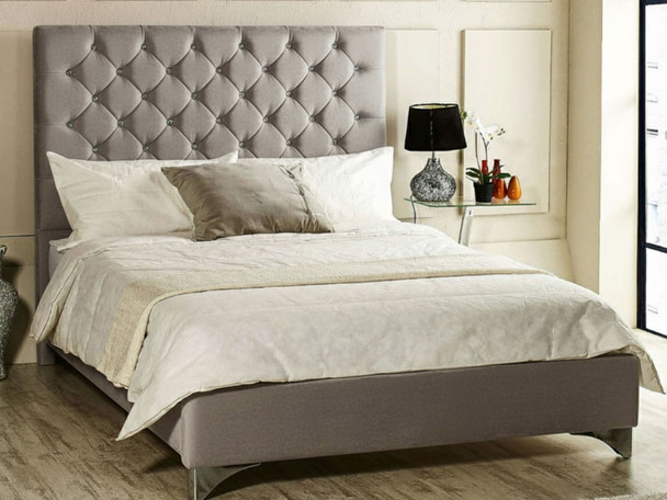 Discover the Esupasaver Seattle upholstered bed frame featuring a deep buttoned headboard and low footboard, crafted with solid wooden slats for durability