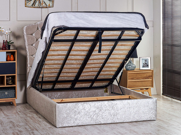 Elevate your bedroom with the Esupasaver Bourges Gas Lift Ottoman Bed Frame, showcasing a chic curved headboard and practical storage solution for your space.