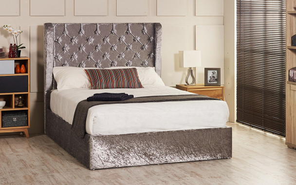 Orchid ottoman wing bed shown in silver crush velvet fabric with diamante buttons
