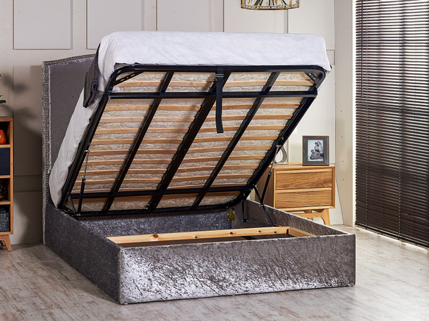  Discover the Esupasaver Konya Ottoman Storage Bed Frame, featuring a stylish curved headboard and elegant chrome nail detailing for a chic bedroom upgrade
