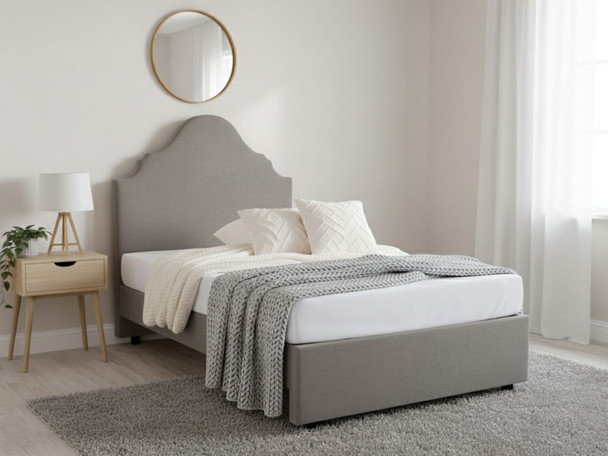 Elevate your bedroom with the Esupasaver Raelyn Upholstered Bed. Choose from luxurious fabrics and enjoy the sturdy design with a curved headboard, crafted in the UK.