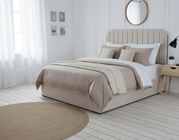 Discover the Esupasaver Brittany Ottoman Storage Bed Frame, featuring a stylish curved headboard, elegant fluted accents, and a practical low footboard for modern living.