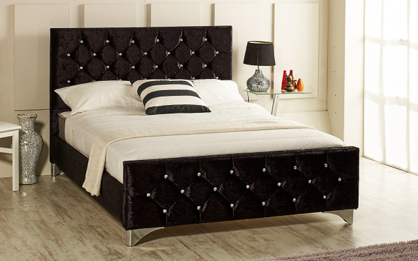 Florence upholstered bed shown in black crush velvet fabric, diamante buttons and chrome feet.