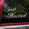 Just Married vinyl decal with elegant flowing script lettering and decorative flourishes for wedding getaway cars